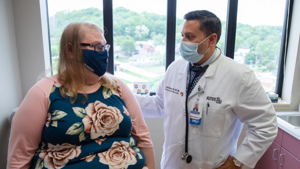 Sarah Drummond with pulmonologist Sumit Mukherjee, MD